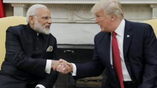 President Donald Trump shakes hands with Indian Prime Minister Narendra Modi as they begin a meeting in the Oval Office of the White House in Washington, June 26, 2017