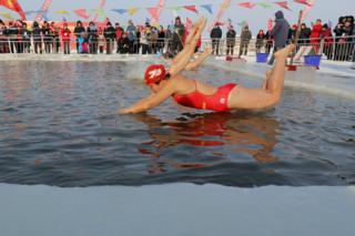 Swimming competition at the Harbin International Ice and Snow Festival