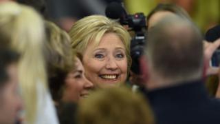 Democratic presidential hopeful Hillary Clinton greets the crowd at her primary night party February 9, 2016 at Southern New Hampshire University in Hooksett, New Hampshire.
