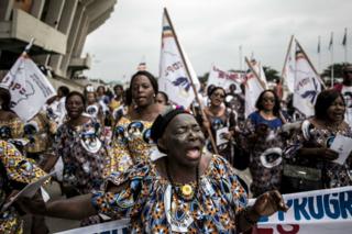 Supporters of former DR Congo Prime Minister and opposition leader Etienne Tshisekedi sing and dance ahead of his mourning ceremony.
