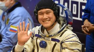 Космонавт Норишиге Канаи