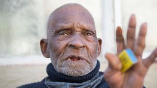 Fredie Blom, pictured on his 116th birthday at his home in Delft, near Cape Town (8 May 2020)