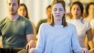 people meditating