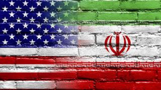 Iranian and US flags
