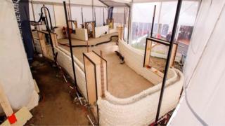 Photo of early stages of house being built