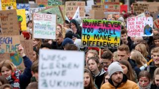 High school students demonstrate against global warming at a Fridays for Future demonstration on March 01, 2019 in Hamburg, Germany.