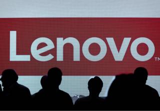 The Lenovo's brand logo is displayed on a screen before a press conference in Hong Kong on May 21, 2015. China's Lenovo said its revenue rose 20 percent in its past fiscal year, helped by its purchase of Motorola last year as the PC maker diversifies into the smartphone market, but net profit growth slowed to just one percent. AFP PHOTO / Philippe Lopez (Photo credit should read PHILIPPE LOPEZ/AFP/Getty Images)