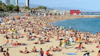 People on foreign beach