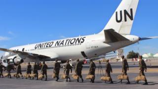 Mauritanian soldiers board a United Nations flight to Central African Republic as a peacekeeping force in Nouakchott, Mauritania, Sunday, Feb 21, 2016.