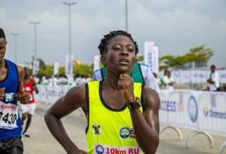 Woman finishing the race