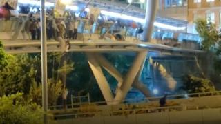 Some protesters used rope ladders to escape the building