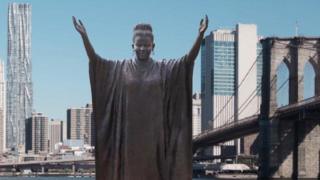 A simulation of how the final statue will look when it is unveiled in New York