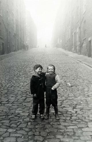 Two children on the cobbled streets of Edinburgh, 1966.