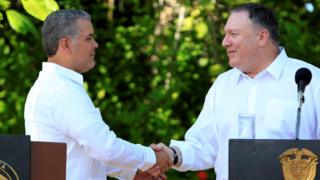 Colombian President Ivan Duque (L) and US Secretary of State Mike Pompeo shake hands after a meeting in Cartagena, Colombia, 2 January 2019