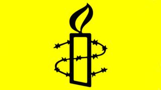 Uluslararası Af Örgütü logosu