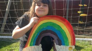 Darcey-with-her-dog-and-rainbow