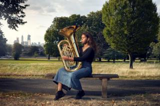 Hanna Mbuya and her Tuba in Denmark Hill, London