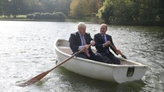 Boris Johnson (left) in a row boat with Czech Republic"s Deputy Foreign Minister Ivo Sramek