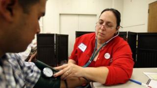 Doctor examining a patient