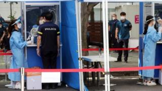 Police undergo virus testing in Seoul, South Korea