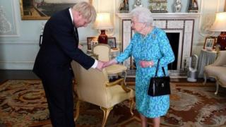 The Queen greeting Boris Johnson after he became prime minister in July