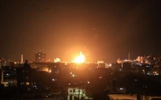 An explosion in Gaza after Israeli air strikes on 20 June 2018