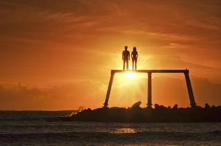 Sculpture silhouette at sunrise