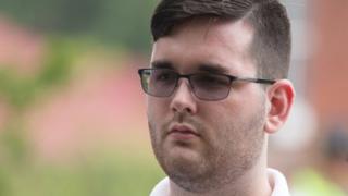 James Alex Fields Jr is seen attending the "Unite the Right" rally in Emancipation Park before being arrested by police on 12 August, 2017