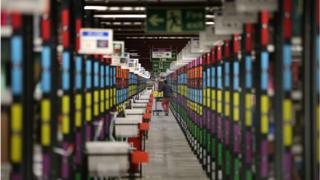 Technology Amazon worker in warehouse