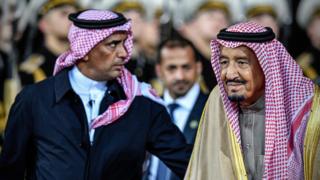 Saudi Arabia's King Salman bin Abdulaziz al-Saud accompanied by his personal bodyguard Gen Abdul Aziz al-Fagham (4 October 2017)
