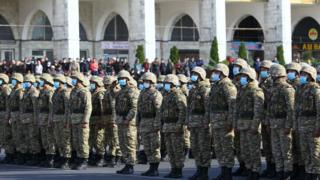 Members of Kyrgyz armed forces stand in formation in Ala-Too Square