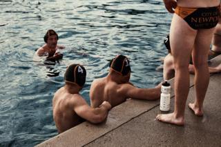 A group of Water Polo players in a pool