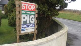 John Holland erected a protest sign in his garden