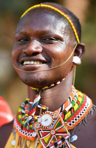A man wearing traditional Masaai dress on March 13, 2019