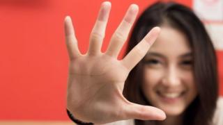 Length of ring and index fingers of women 'linked to sexuality'