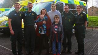 Jayne Rowland and family visiting staff at the Taunton Ambulance Station