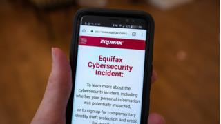 An image showing an Equifax cyber breach warning on a phone