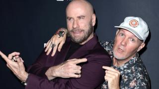 John Travolta and Fred Durst