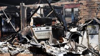 General view of a destroyed home whitegoods following bushfire damage on November 13