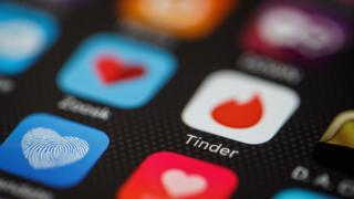 Tinder app on phone screen