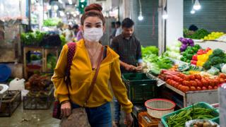 Woman in a mask in India