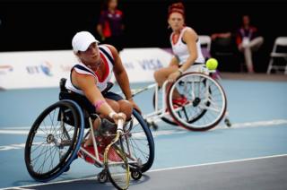 Lucy Shuker (L) and Jordanne Whiley (R) compete in the Women's Doubles Wheelchair Tennis at London 2012 Paralympic Games