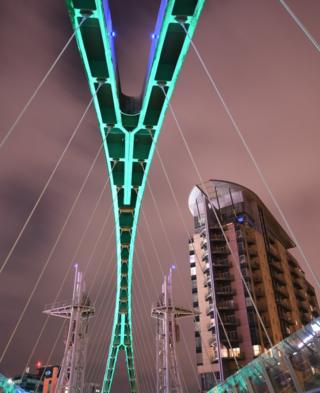Bridge lit over water