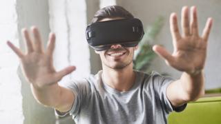 environment Man wearing a VR headset
