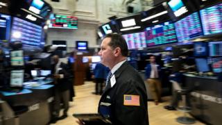 Traders work on the floor of the New York Stock Exchange (NYSE) in New York, U.S., January 7, 2019. R