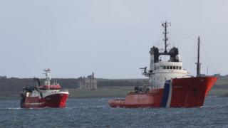 Russa Taign being towed