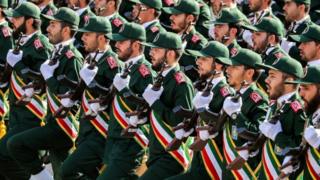 Members of Iran"s Revolutionary Guards Corps (IRGC) march during an annual military parade.