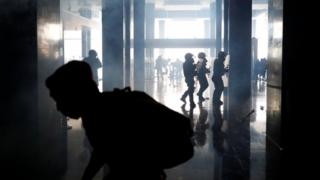 Demonstrators and police clash inside the National Assembly building, in Quito, Ecuador, October 8, 2019