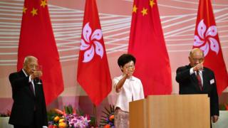 Carrie Lam at a flag-raising ceremony in Hong Kong on Wednesday