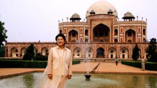 South Korean first lady Kim Jung-sook with Humayun's grave in the background